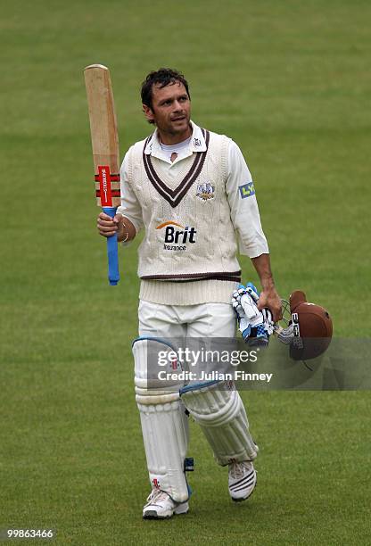 Mark Ramprakash of Surrey walks off after being caught out off the bowling of Dawid Malan of Middlesex during day two of the LV= County Championship...