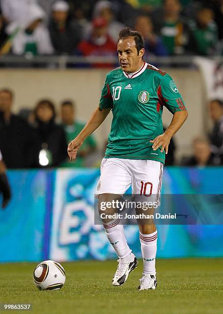 Cuauhtemoc Blanco of Mexico dribbles up the field against Senegal during an international friendly at Soldier Field on May 10, 2010 in Chicago,...