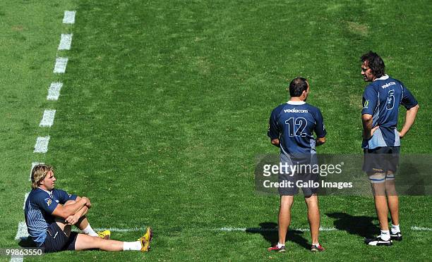 Wynand Olivier, Fourie du Preez and Victor Matfield of the Bulls chat during a Vodacom Bulls training session at Orlando Stadium on May 18, 2010 in...