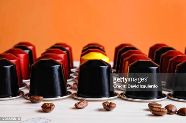 set of espresso coffee capsules for machine - space capsule stock pictures, royalty-free photos & images