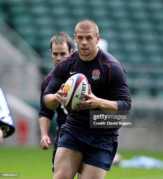 Dave Attwood runs with the ball during an England training session held at Twickenham on May 18, 2010 in Twickenham, England.