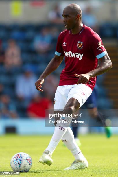 Angelo Ogbonna of West Ham passes the ball during the pre-season friendly match between Wycombe Wanderers and West Ham United at Adams Park on July...