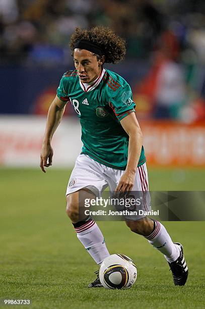 Andres Guardado of Mexico dribbles up the field against Senegal during an international friendly at Soldier Field on May 10, 2010 in Chicago,...