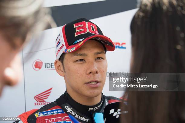 Takaaki Nakagami of Japan and LCR Honda Idemitsu speaks with journalist at the end of the qualifying practice during the MotoGp of Germany -...