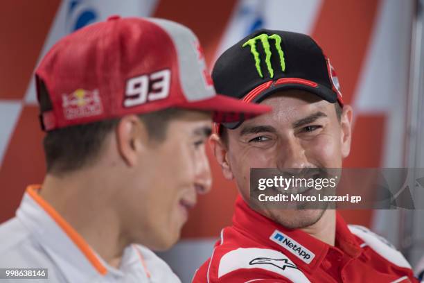 Jorge Lorenzo of Spain and Ducati Team smiles during the press conference at the end of the qualifying practice during the MotoGp of Germany -...