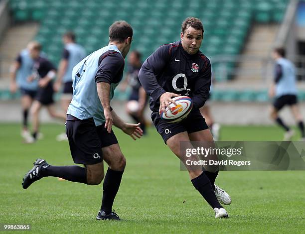 Olly Barkley moves Charlie Hodgson during an England training session held at Twickenham on May 18, 2010 in Twickenham, England.