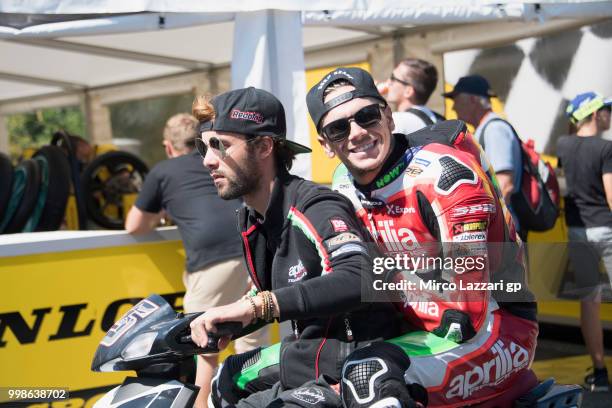 Scott Redding of Great Britain and Aprilia Racing Team Gresini in scooter in paddock at the end of the qualifying practice during the MotoGp of...