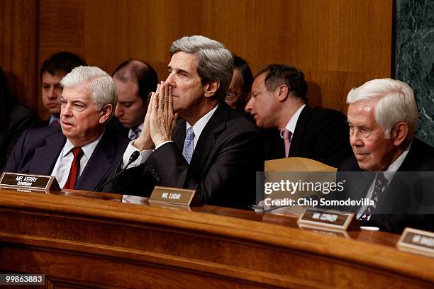 Senate Foreign Relations Committee Chairman John Kerry (D-MA , ranking member Sen. Richard Lugar and committee member Sen. Christopher Dodd listen to...