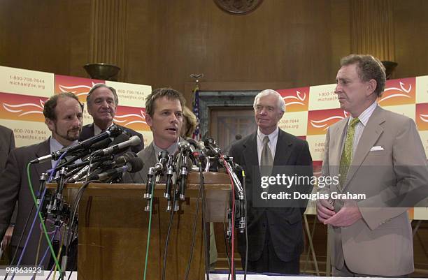 Michael J. Fox along withPaul Wellstone, D-Minn., Tom Harkin, D-Iowa, Thad Cochran, R-Miss., and Arlen Specter, R-Pa., during a press conference on...