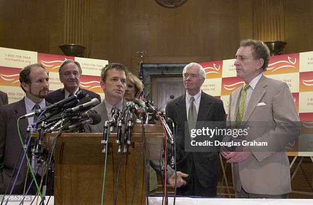 Michael J. Fox along withPaul Wellstone, D-Minn., Tom Harkin, D-Iowa, Thad Cochran, R-Miss., and Arlen Specter, R-Pa., during a press conference on...