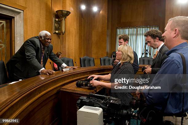 Bertie Bowman of the Senate Foreign Relations Committee talks to the media about does and don't before the start of the full committee hearing on...