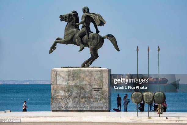 The bronze statue of Alexander the Great, the King of Macedonia, the king of Greece, on his famous horse Bucephalus located at the waterfront of...