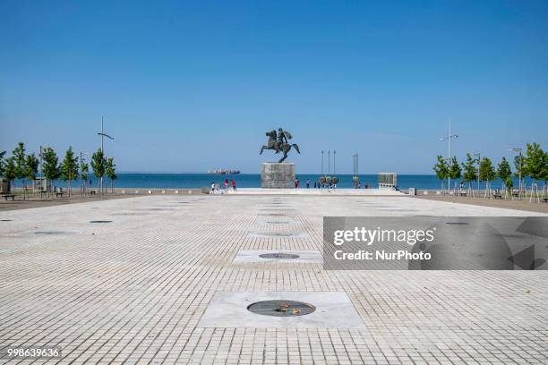 The bronze statue of Alexander the Great, the King of Macedonia, the king of Greece, on his famous horse Bucephalus located at the waterfront of...