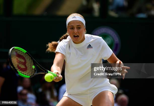 Jelena Ostapenko of Latvia in action against Angelique Kerber of Germany in the ladies' semi finals at the All England Lawn Tennis and Croquet Club...