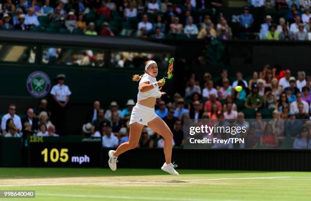 Jelena Ostapenko of Latvia in action against Angelique Kerber of Germany in the ladies' semi finals at the All England Lawn Tennis and Croquet Club...