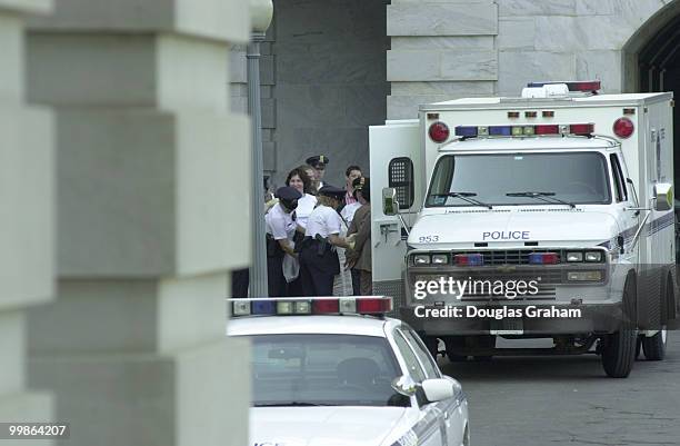 Protesters are arrested and removed from the Capitol after they disrupted the house gallery by handcuffing themselves to the gallery chairs and...