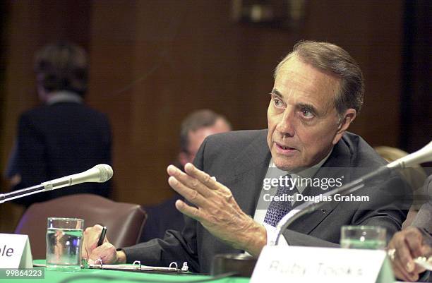 Bob Dole and Chairman Charles E. Grassley, R-Iowa, during the hearing on hospice care.