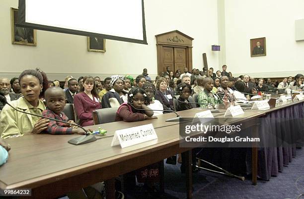 The eight victoms of forced amputation listen during the International Relations Committee hearing on the impact of the Sierra Leone conflict.