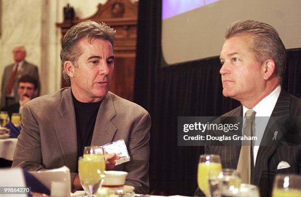 America's Most Wanted" host, John Walsh and Mark Foley, R-Fl., talk during the Congressional breakfast for Missing and Exploited Children to call on...