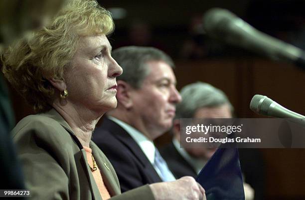 Jean Carnahan , D-Mo., John Ashcroft and Christopher S. Bond, R-Mo., listen to opening statements during Ashcroft's conformation hearing for attorney...