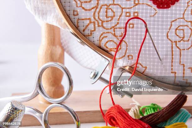 tools for embroidery on embroidery frame front view - embroidery frame stock pictures, royalty-free photos & images