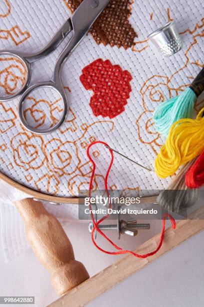 tools for embroidery on embroidery frame top view - embroidery frame stock pictures, royalty-free photos & images