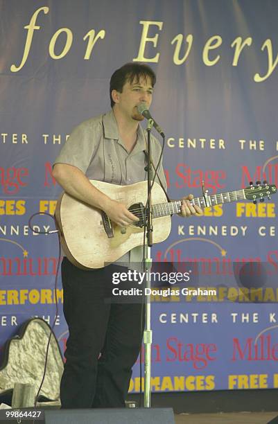 Peter Mulvey guitarist from Milwaukee entertains a crowd on the East Lawn as part of the John F. Kennedy Center for the Performing Arts.