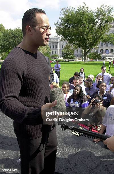 The Rock" was on Capitol Hill at a rally to celebrate the success of the Smackdown Your Vote. Smackdown Your Vote is a nonpartisan voter registration...