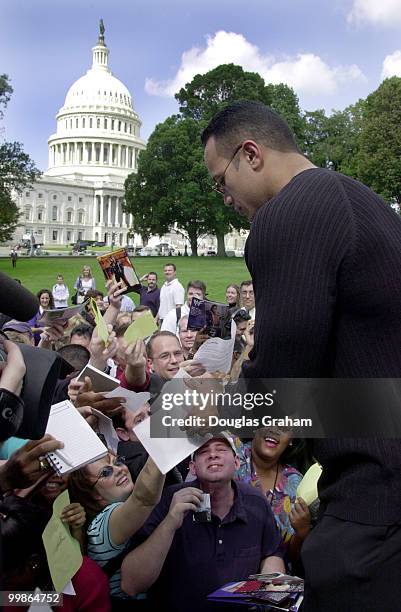 The Rock" was on Capitol Hill at a rally to celebrate the success of the Smackdown Your Vote. Smackdown Your Vote is a nonpartisan voter registration...
