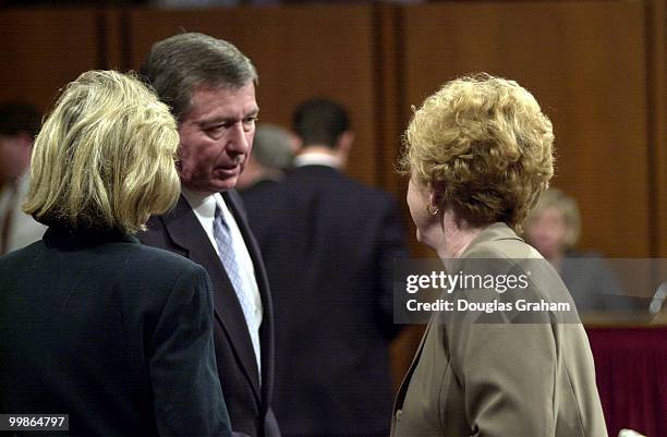 Kay Bailey Hutchison, R-Texas, John Ashcroft and Jean Carnahan , D-Mo., talk before the start of Ashcroft's conformation hearing for attorney general...