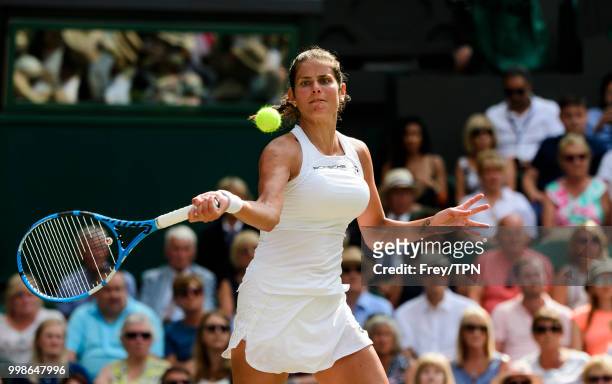 Julia Georges of Germany in action against Serena Williams of the United States in the ladies' semi finals at the All England Lawn Tennis and Croquet...