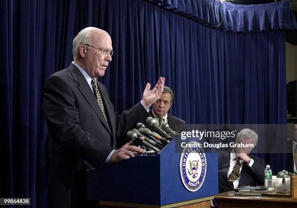 Patrick J. Leahy, D-Vt., makes a point as Richard J. Durbin, D-Ill., and Edward M. Kennedy, D-Mass., look on during a press conference after the...