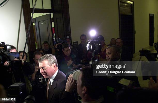 Attorney General nominee, John Ashcroft, R-Mo., makes his way through a sea of reporter and photographers on his way to a meeting with Patrick J....