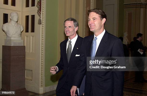 Tom Carper, D-De., and Evan Bayh, walk to the Senate Luncheon after voting on the Hagel Amendment.