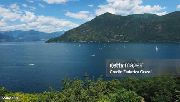 dinghy regatta on lake maggiore near cannobio - cannobio stock pictures, royalty-free photos & images