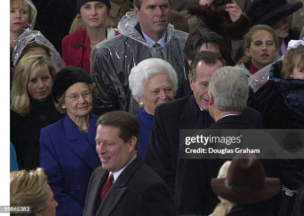 Former President George Bush Sr. And former First Lady Barbara Bush greet President Bill Clinton and Vise President Al Gore as they enter the West...