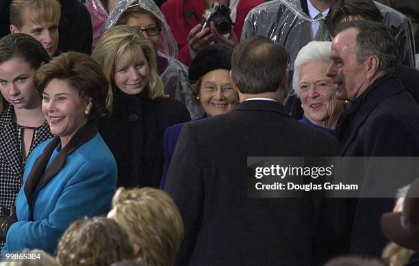 Former President George Bush Sr. And former First Lady Barbara Bush greet Vise President Al Gore as he enters the West Front of the U.S. Capitol for...