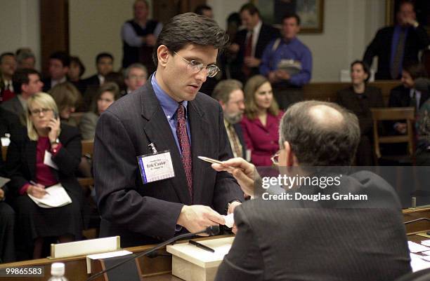 Eric Cantor, R-Va., talks with House Superintendent Robert Miley about his new office as members of the freshman class in the background wait for...