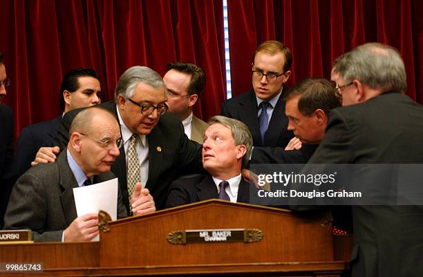 Ranking Member Paul E. Kanjorski, D-Pa., John J. LaFalce, D-N.Y., Chairman Richard H. Baker, R-La., and Michael G. Oxley, R-Ohio, talk before the...