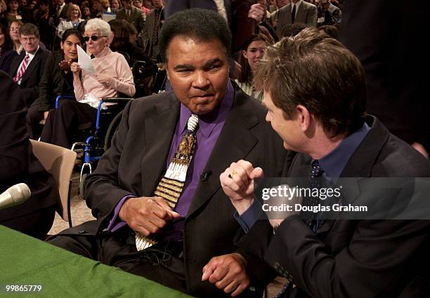 Muhammad Ali, former heavyweight boxing champion and Michael Fox, actor/founder, Michael Fox Foundation for Parkinson's Research, ham it up for the...
