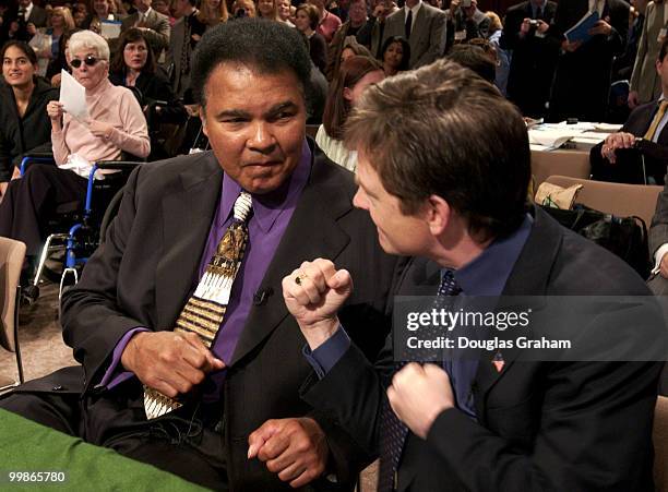 Muhammad Ali, former heavyweight boxing champion and Michael Fox, actor/founder, Michael Fox Foundation for Parkinson's Research, ham it up for the...