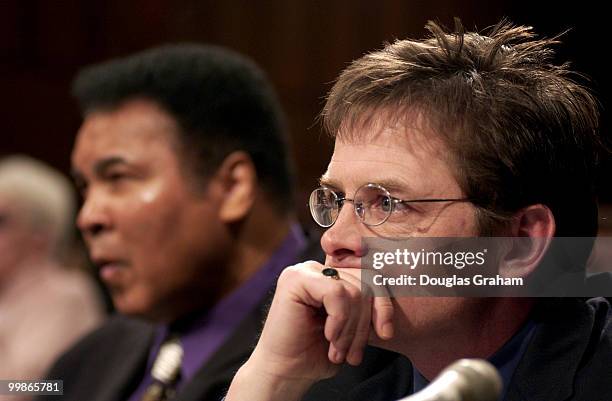 Muhammad Ali, former heavyweight boxing champion and Michael Fox, actor/founder, Michael Fox Foundation for Parkinson's Research, during the Labor,...