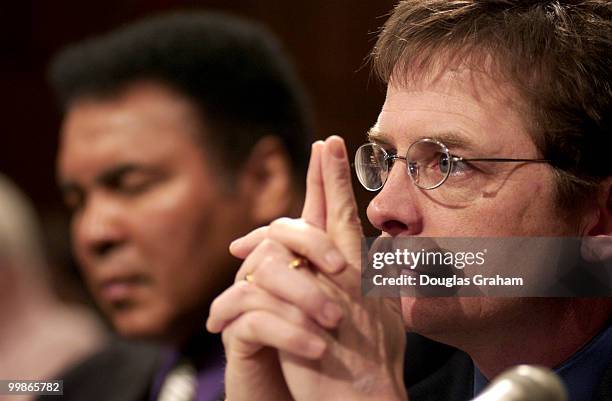 Muhammad Ali, former heavyweight boxing champion and Michael Fox, actor/founder, Michael Fox Foundation for Parkinson's Research, during the Labor,...