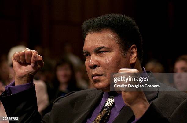 Muhammad Ali, former heavyweight boxing champion strikes his trade mark pose during the Labor, HHS, Education and Related Agencies Subcommittee...