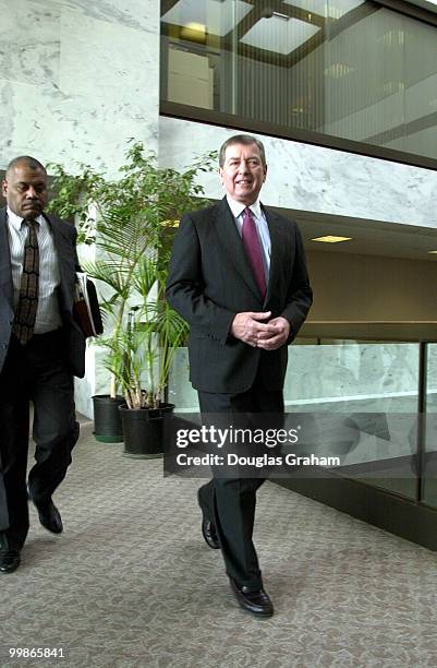 Attorney General nominee, John Ashcroft, R-Mo., heads for a meeting with Arlen Specter, R-Pa., in the Hart Senate Office Building.