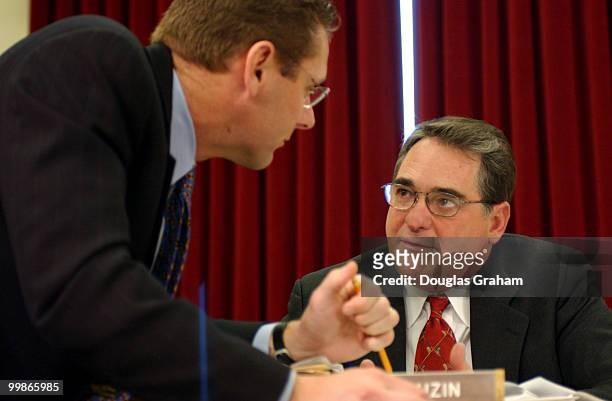 Steve Largent, R-Okla., and Chairman Billy Tauzin, R-La.during the oversight and investigations subcommittee hearing to examine the findings of...