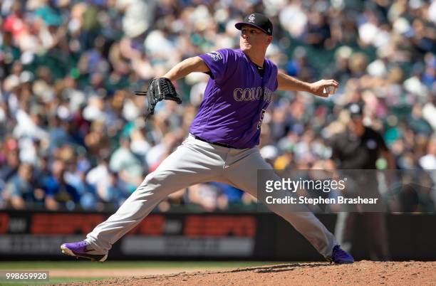 Reliever Jake McGee of the Colorado Rockies delivers a pitch during a game against the Seattle Mariners at Safeco Field on July 8, 2018 in Seattle,...