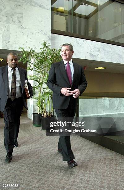 Attorney General nominee, John Ashcroft, R-Mo., heads for a meeting with Arlen Specter, R-Pa., in the Hart Senate Office Building.