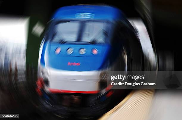 Amtrak's new Acela Express train pulls out of Washiongton's Union Station in a blurr enroute to New York's Penn Station. The trip takes about 2 1/2...