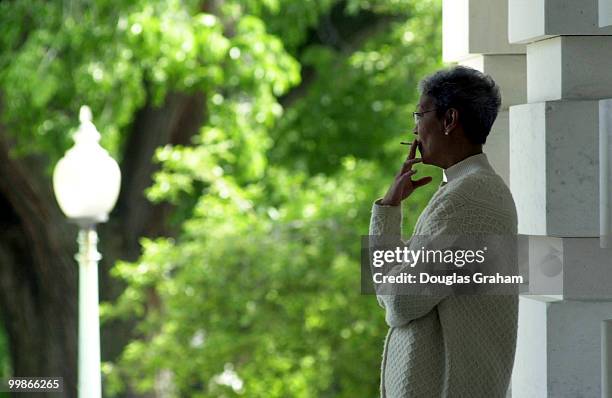 Staffer takes a smoke break outside the East Front steps of the U.S. Capitol.